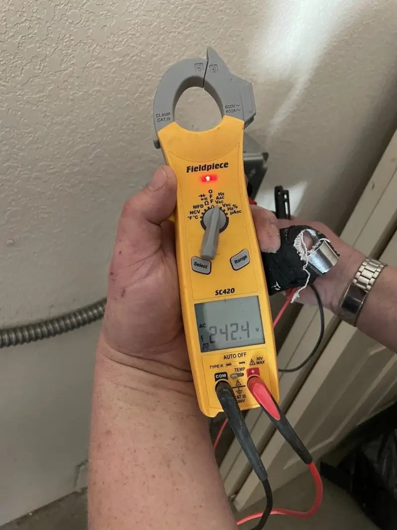 Voltage testing with clamp meter during Recessed Lighting Installation in Holmdel